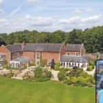 Jack Grealish house exterior view showing the luxury Birmingham mansion with modern architecture and landscaped gardens.